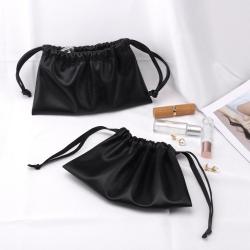 Custom Emboss Drawstring Pu Leather Pouch Skincare Travel Cosmetic Bag Black Waterproof Leather Bag