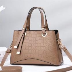 2023 New Solid Color Versatile Tassel Stone Pattern One Shoulder Handheld Cross border Large Capacity Light Luxury Stylized Wome