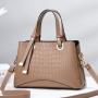 2023 New Solid Color Versatile Tassel Stone Pattern One Shoulder Handheld Cross border Large Capacity Light Luxury Stylized Wome