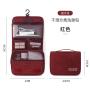 Men and women on business trips carry large capacity toiletries that can be hung for dry and wet separation