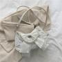 Popular retro bowknot bags for women, new spring style, trendy and fashionable pearl underarm shoulder and crossbody bag