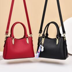 2023 New Fashion Women's PU Leather Large Capacity One Shoulder Oblique Straddle Bag Fashion Pendant Mother Bag