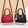2023 New Fashion Women's PU Leather Large Capacity One Shoulder Oblique Straddle Bag Fashion Pendant Mother Bag
