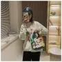 Wholesale Cartoon Fashion Handbag New Ladies Nylon Shoulder Bag Cute Astronaut Smiling Face Cross-body Bag