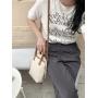 Factory wholesale PU fabric hand bag drawstring design tote bag women weaving design diagonal bucket bag ladies