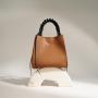 2024 new niche minimalist and fashionable retro hand-held crossbody women's bag