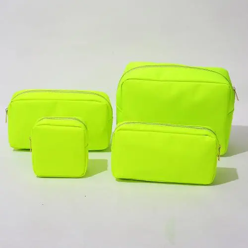 Stock wholesale 18 colors Custom Cheap Waterproof Towel Embroidery Patch Logo Small Cosmetic Travel bag Nylon bag