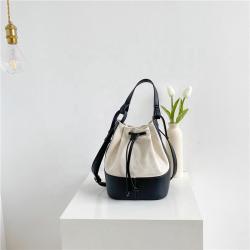 Bag female  2021 summer Korean edition fashion trend skew cross bag personality spliced canvas hand-held bucket bag