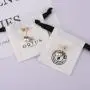 Custom Logo Printed Mini Cotton Canvas Jewelry Bag Drawstring Brush Canvas Earring Ring Packing Jewelry Pouch