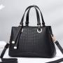 2023 New Solid Color Versatile Tassel Stone Pattern One Shoulder Handheld Cross border Large Capacity Light Luxury Stylized Wome