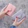 Factory wholesale 2024 new retro fashion metal heart-shaped small women's short wallet student wallet coin purse money card clip
