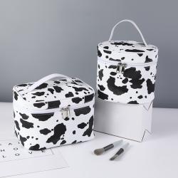 Wholesale Beauty PU Makeup Storage Bag Portable Waterproof Travel Custom Cow Pattern Print Cosmetic Bags