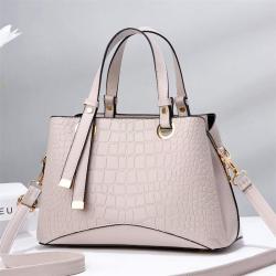 2023 New Solid Color Versatile Tassel Stone Pattern One Shoulder Handheld Cross border Large Capacity Light Luxury Stylized Wome