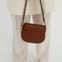 2024 Custom Brown Smooth Pu Leather Ladies Cross Body Purse Bag Round Saddle Flap Small Women Shoulder Bag