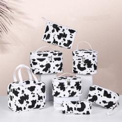 Wholesale Beauty PU Makeup Storage Bag Portable Waterproof Travel Custom Cow Pattern Print Cosmetic Bags