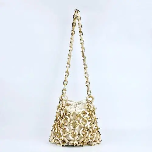 Small niche design hollowed out acrylic woven shoulder bag