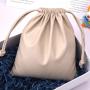 Custom Emboss Printing Waterproof PU Leather Cosmetic Power Bank Storage Bag Drawstring Leather Packaging Pouch