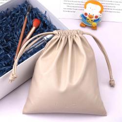 Custom Emboss Printing Waterproof PU Leather Cosmetic Power Bank Storage Bag Drawstring Leather Packaging Pouch