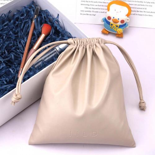Custom Emboss Printing Waterproof PU Leather Cosmetic Power Bank Storage Bag Drawstring Leather Packaging Pouch