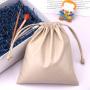 Custom Emboss Printing Waterproof PU Leather Cosmetic Power Bank Storage Bag Drawstring Leather Packaging Pouch