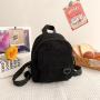 Mini backpack with striped velvet texture and versatile backpack