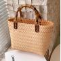 2023 Fashionable Summer Women's Bag New Style Winding Flow Weaving Large Capacity Bucket Bag Simple Straw Woven Women's Handbag