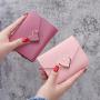 Factory wholesale 2024 new retro fashion metal heart-shaped small women's short wallet student wallet coin purse money card clip