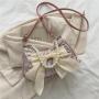 Popular retro bowknot bags for women, new spring style, trendy and fashionable pearl underarm shoulder and crossbody bag