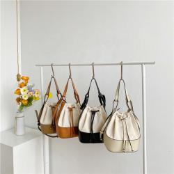 Bag female  2021 summer Korean edition fashion trend skew cross bag personality spliced canvas hand-held bucket bag
