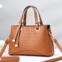 2023 New Solid Color Versatile Tassel Stone Pattern One Shoulder Handheld Cross border Large Capacity Light Luxury Stylized Wome