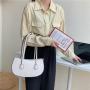 Korean fashion ladies elegant temperament handbags pure color simple PU shoulder bag irregular retro popular underarm bag