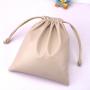 Custom Emboss Printing Waterproof PU Leather Cosmetic Power Bank Storage Bag Drawstring Leather Packaging Pouch