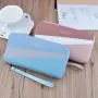 New women's long double zippered double-layer fashionable contrasting color large capacity zero wallet
