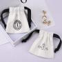 Custom Logo Printed Mini Cotton Canvas Jewelry Bag Drawstring Brush Canvas Earring Ring Packing Jewelry Pouch