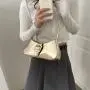 2024 spring and summer new fashion hand bill of lading shoulder crossbody armpit small square female bag to support a large