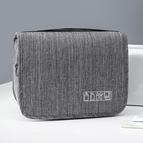 Men and women on business trips carry large capacity toiletries that can be hung for dry and wet separation